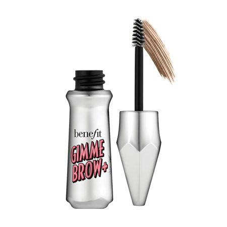 Mini Gimme Brow+ eyebrow gel in a silver, sleek tube with a pointed cap, featuring a small brush applicator for precise volumizing and tinting of brows.