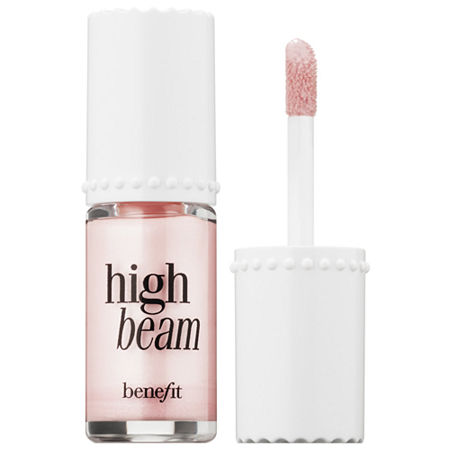 Satin pink liquid highlighter in a clear glass bottle with a white cap, featuring a doe-foot applicator for easy cheek application.