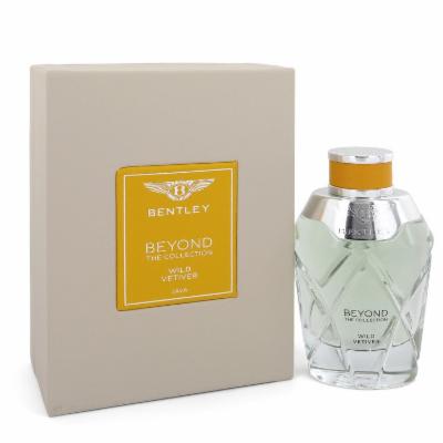 Clear glass bottle with a diamond pattern, silver cap, and orange accent, beside a beige box featuring a yellow label with "Bentley Beyond Wild Vetiver" in elegant font.