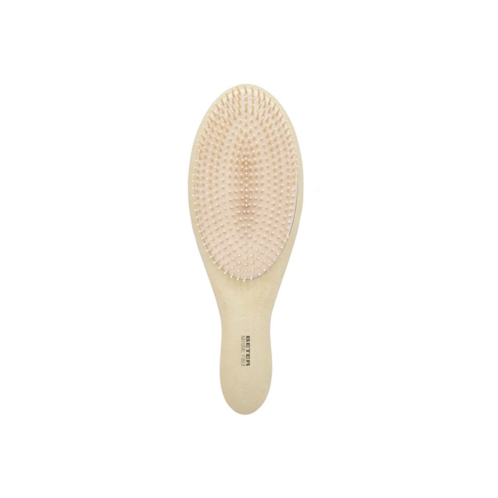 Beter Deslia hair brush in a soft beige color, featuring an oval shape, flexible bristles, and a smooth handle for comfortable grip and detangling.