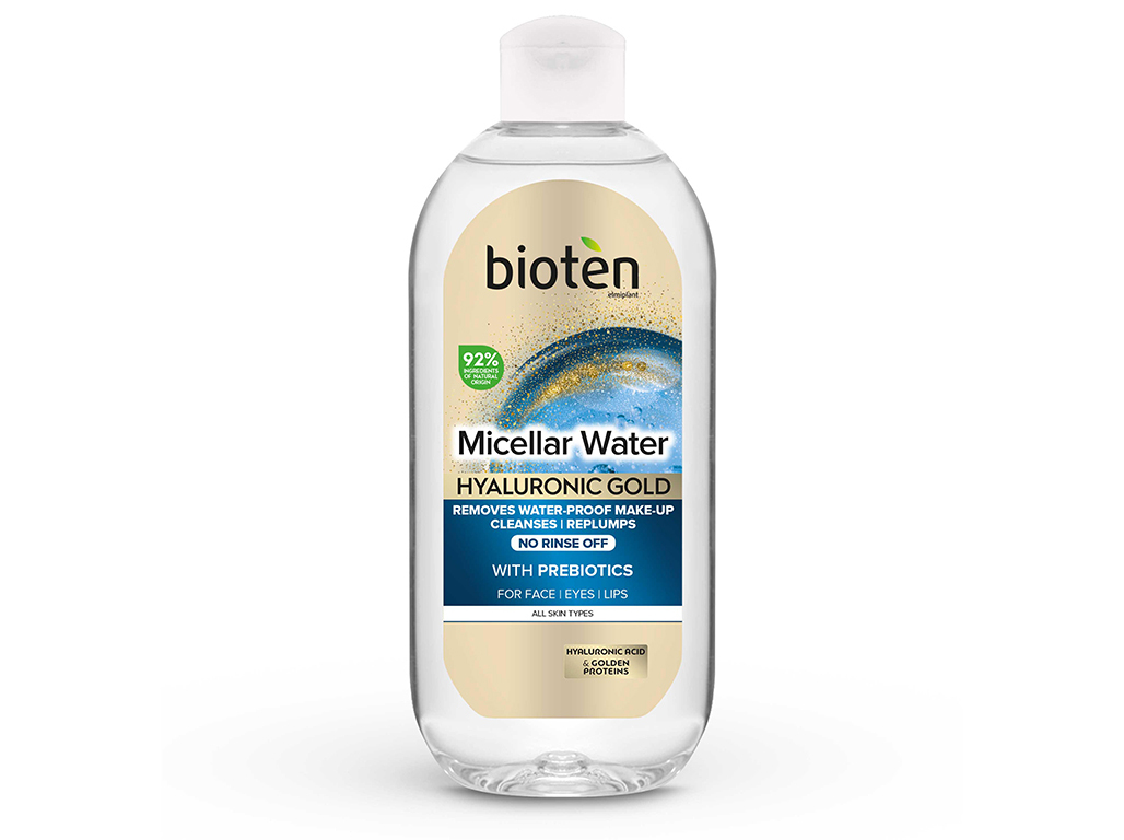 Clear plastic bottle of Bioten Micellar Water with a white flip-top cap, featuring a gold and blue label that highlights "Hyaluronic Gold" and claims to remove waterproof makeup.