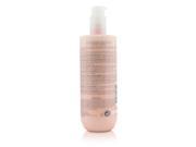 Light pink bottle of Biotherm Biosource Softening & Make-up Removing Milk for dry skin, featuring a pump dispenser and labeled with product details in a sleek design.