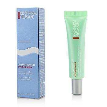 Light blue box with white text and wave design next to a green tube with silver cap, labeled "Aquapower Eye De-Puffer" by Biotherm Homme, 15ml/0.5oz.