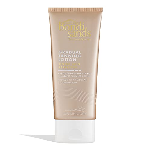 Bondi Sands Gradual Tanning Lotion in a 150ml tube, featuring a gold and beige color scheme, with a flip-top cap and text highlighting its tinted skin perfecting properties.