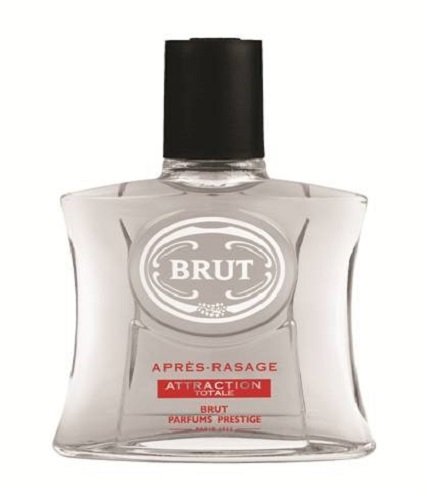 Clear glass bottle with a distinctive curved shape, featuring a black cap and a white label with the word "BRUT" and "ATTRACTION TOTALE" in red text.