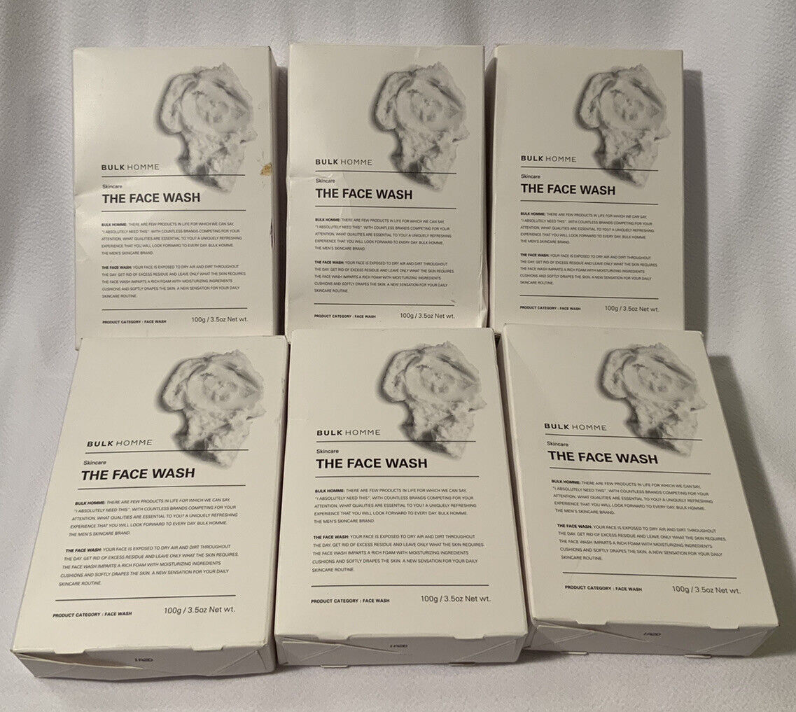 Six white boxes of "Bulk Homme the Face Wash," each labeled with product details, featuring a minimalist design and a textured image of the product on the front.