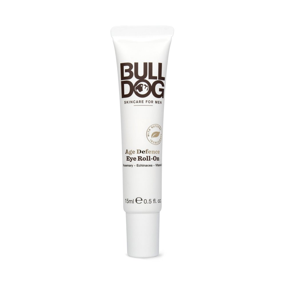 White tube with a silver roll-on tip, featuring brown text that reads "BULLDOG" and "Age Defence Eye Roll-On 15Ml," designed for men's skincare.
