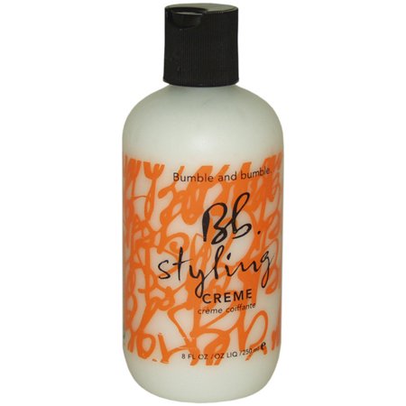 White bottle with a black pump top, featuring orange graffiti-style text that reads "Bumble and bumble Bb. styling Crème" on the front, 8 fl oz size.