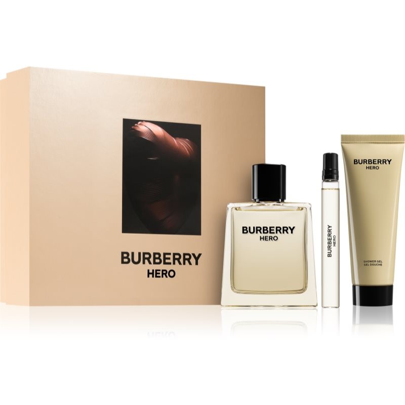 Burberry Hero gift set featuring a 100 ml EDT bottle, a 75 ml shower gel, and a 10 ml miniature, all presented in a sleek beige box with a dark logo.