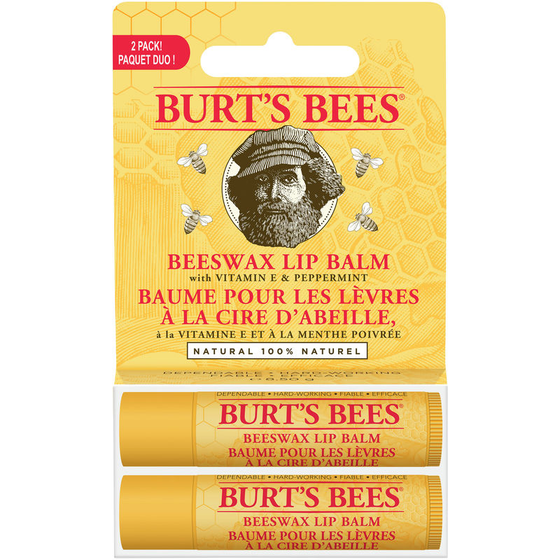 Two tubes of Burt's Bees 100% Natural Moisturizing Lip Balm in a yellow packaging, featuring a vintage illustration of a man and bees, with key ingredients listed prominently.