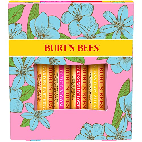 Four Burt's Bees lip balms in a colorful pink box adorned with blue flowers, featuring flavors like Garden Party and Sunny Days Ahead.