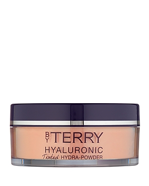 Hyaluronic Tinted Hydra-Powder in shade N2 Apricot, housed in a sleek, clear plastic jar with a dark purple lid, featuring the BY TERRY logo prominently on the front.