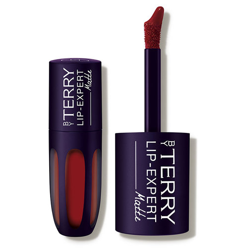 Deep red liquid lipstick in a sleek, dark purple tube with a glossy finish, featuring a doe-foot applicator for precise application.