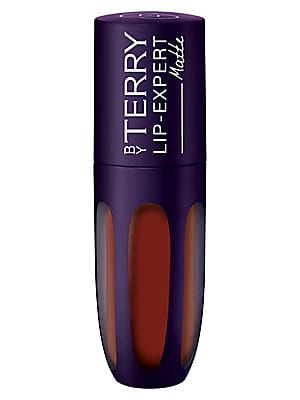 Deep burgundy liquid lipstick in a sleek, purple tube with a glossy finish, featuring a pointed applicator for precise application.