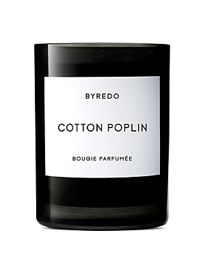 Black glass candle with a minimalist white label, featuring the text "BYREDO COTTON POPLIN" in bold, elegant font, designed for home fragrance.