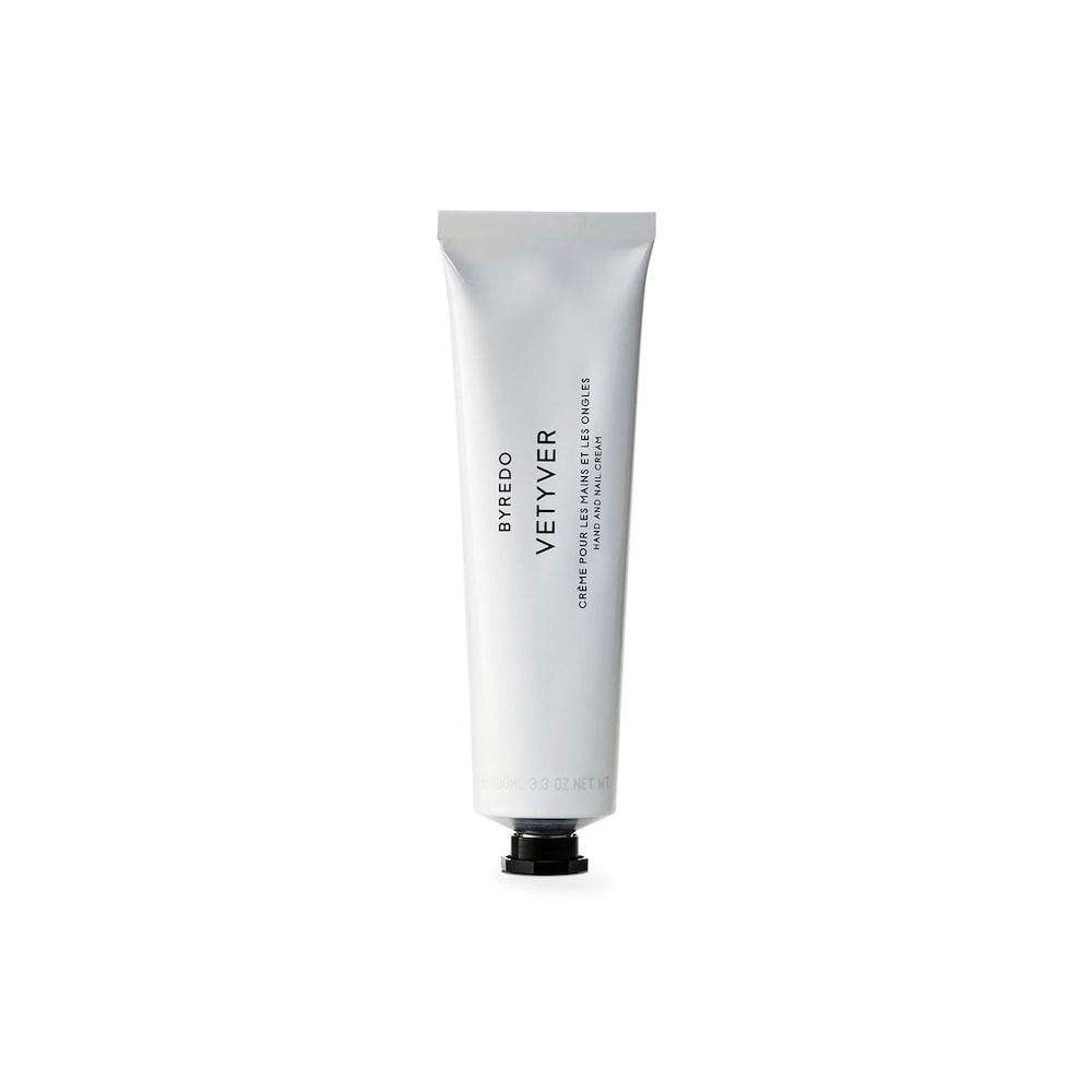 White tube of Byredo Vetyver Hand Cream, 100ml, featuring minimalist design with black text and a black cap, showcasing a luxurious and elegant aesthetic.