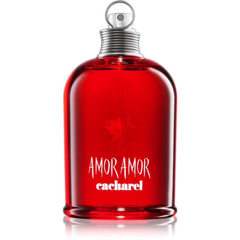 Red glass bottle of Cacharel Amor Amor Eau De Toilette, featuring a silver metal cap and white text on the front, with a floral design visible inside the bottle.