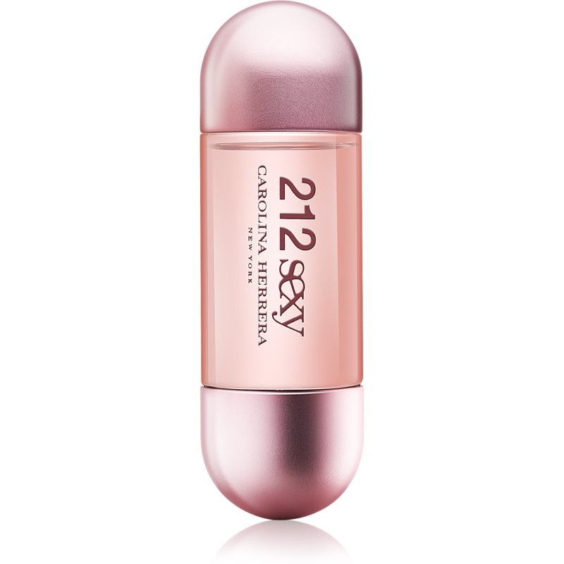 A sleek, oval-shaped perfume bottle with a pink gradient and metallic rose gold cap, labeled "212 Sexy Carolina Herrera" in elegant black font.