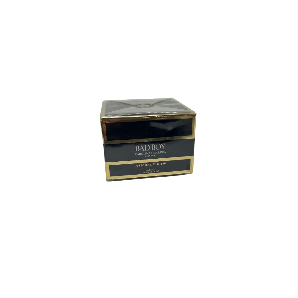 Black and gold square container of Carolina Herrera Bad Boy hair clay, featuring a sleek design and bold branding on the front.