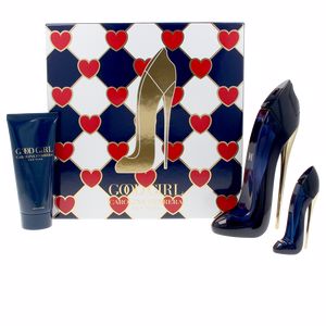 Three-piece gift set featuring a navy blue and gold high-heeled shoe-shaped perfume bottle, a matching smaller bottle, and a body lotion tube, all in a heart-patterned box.