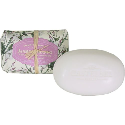 White Jasmine soap by Castelbel, featuring a smooth oval white bar and a floral-printed wrapper with a ribbon, labeled "Jasmin Branco," weighing 5.3 oz.