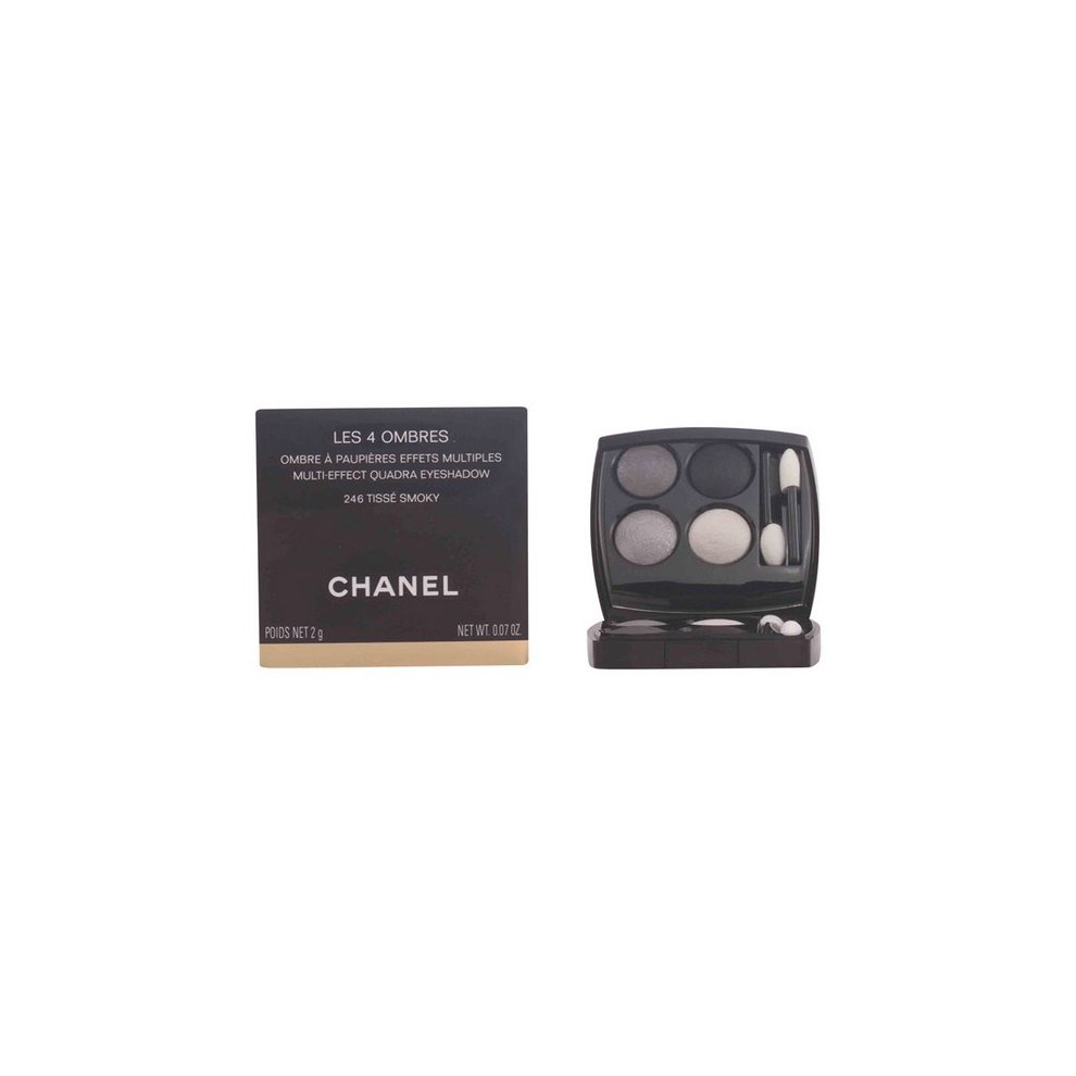 Chanel Les 4 Ombres Quadra Eye Shadow in No. 324 Blurry Blue features four shades in a sleek black compact, including blues and grays, with a reflective finish and brand logo.