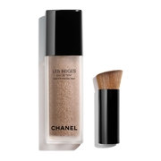 Chanel Les Beiges Eau De Teint Water Fresh Tint in Light Deep, 30ml glass bottle with a black cap, accompanied by a small brush with a wooden handle.