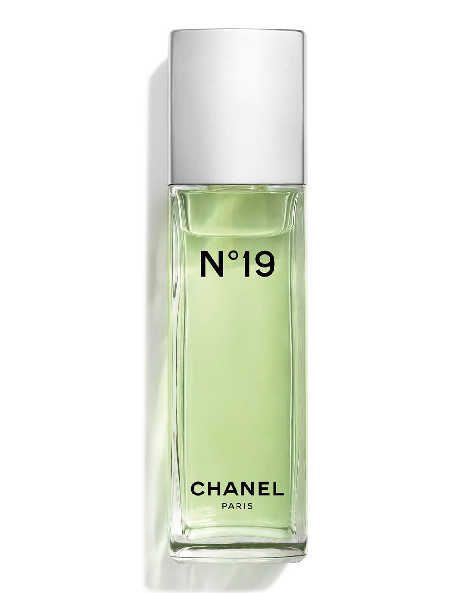 Chanel No 19 Eau De Toilette in a sleek, rectangular glass bottle with a silver cap, featuring a light green liquid and bold black text on the front.