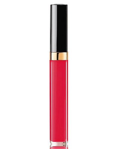 Chanel Rouge Coco Gloss in a sleek transparent tube, featuring a vibrant red gloss with a glossy finish, topped with a shiny black cap and a gold band.