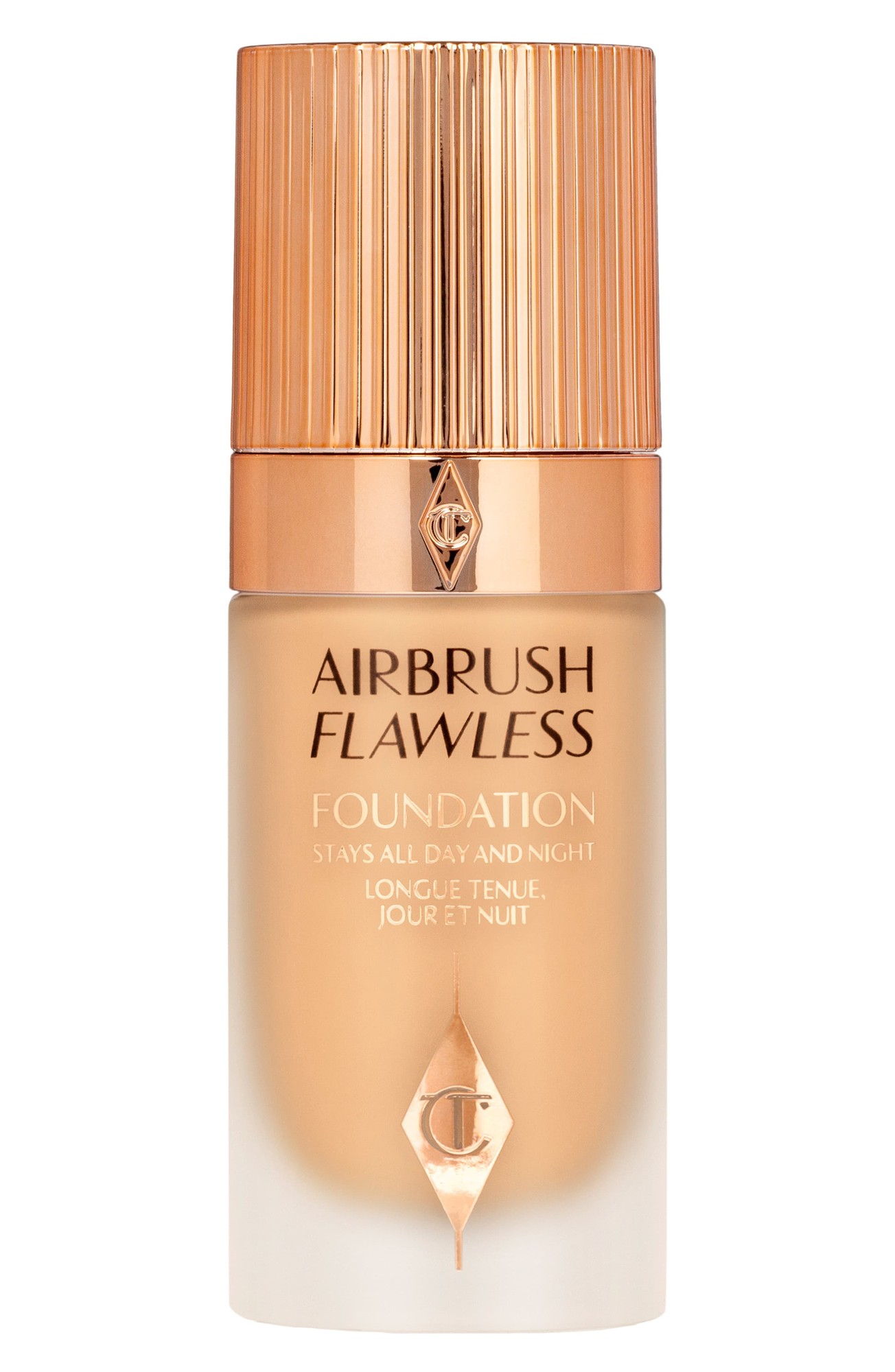 Charlotte Tilbury Airbrush Flawless Foundation in Beige features a sleek glass bottle with a gold ribbed cap and elegant branding, designed for long-lasting wear.