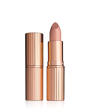 Charlotte Tilbury K.I.S.S.I.N.G Lipstick in "Nude Kate," featuring a sleek rose gold tube with ribbed detailing and a creamy nude pink bullet.