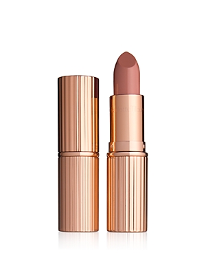 Charlotte Tilbury K.I.S.S.I.N.G Lipstick in Penelope Pink, featuring a sleek, rose gold tube with ribbed detailing and a soft, muted pink lipstick bullet.