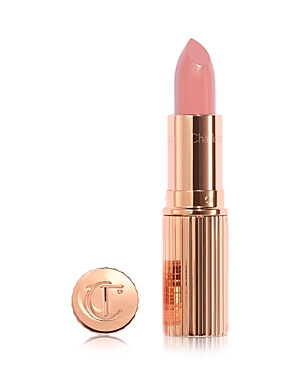 Rose gold lipstick tube with ribbed design, featuring a bullet of soft pink lipstick and a round cap embossed with "CT" logo.