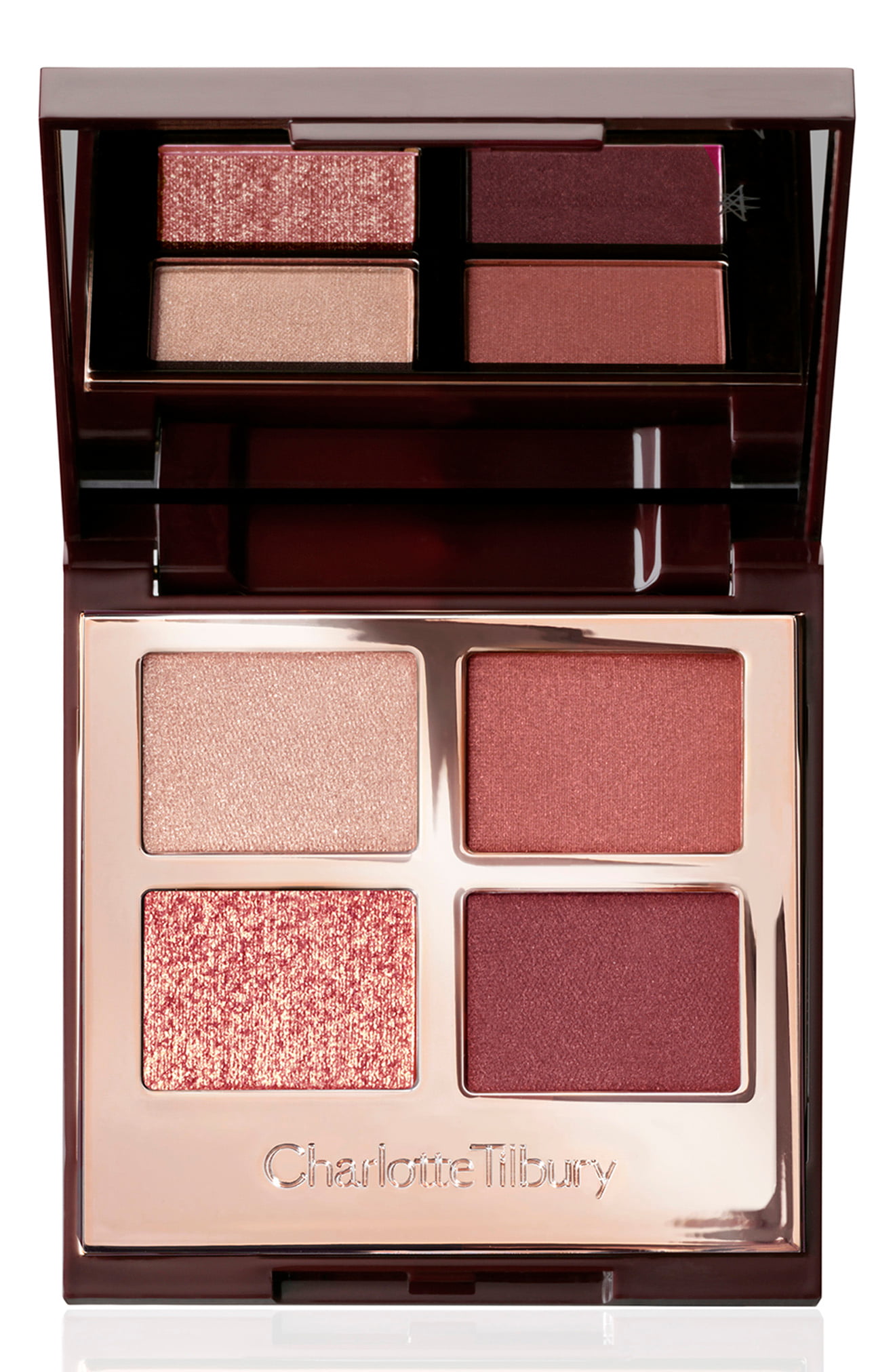 Charlotte Tilbury Eyes to Mesmerize eyeshadow palette featuring four shades: a soft pink, a shimmering gold, and two rich burgundy tones in a sleek burgundy compact.