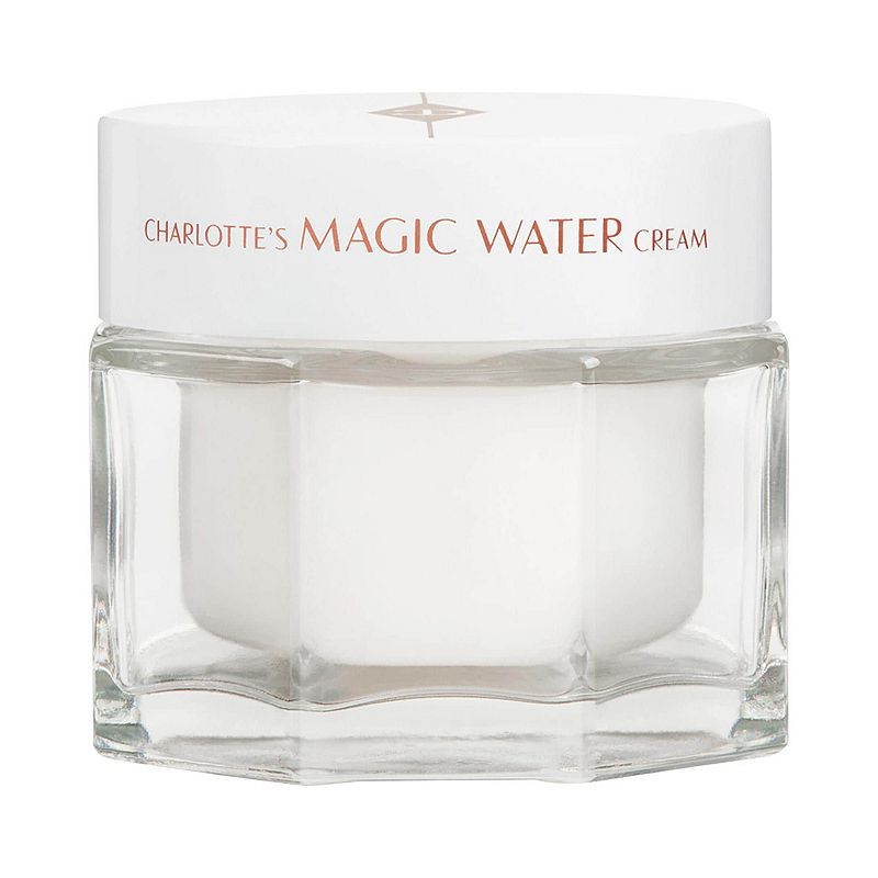 Clear glass jar with a white lid, featuring the text "Charlotte's Magic Water Cream" in elegant rose gold lettering, containing 50ml of anti-ageing cream.