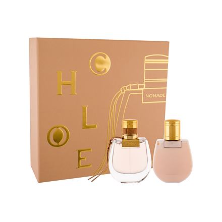 Chloé Nomade gift set featuring a 50ml Eau de Parfum in a clear glass bottle and a matching scented moisturizing body lotion, presented in a gold-accented beige box.