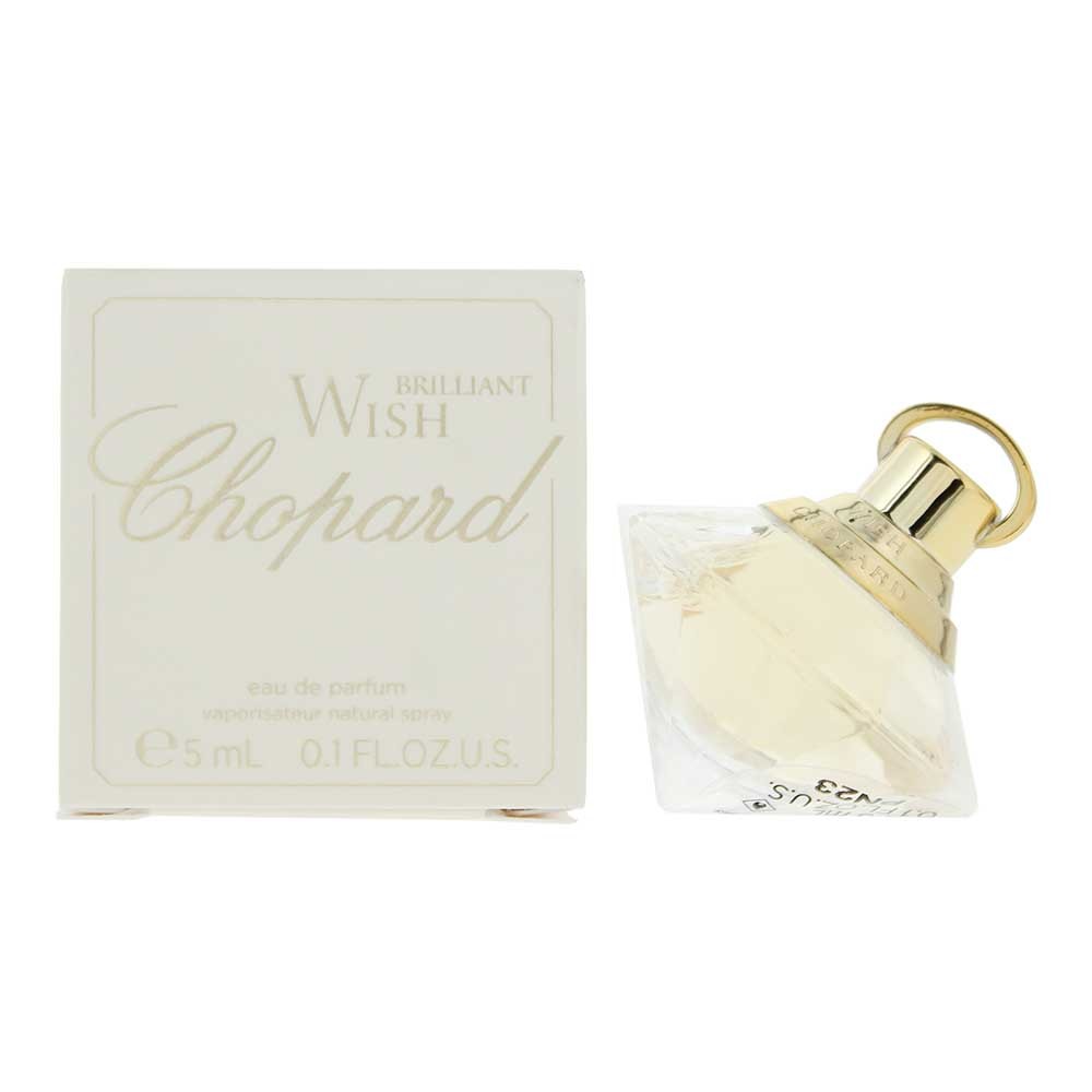 Chopard Brilliant Wish Eau De Parfum 5ml mini features a clear glass bottle with a gold cap, alongside a white box with elegant gold lettering.
