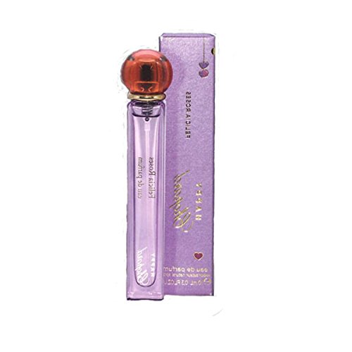 Chopard Happy Chopard Felicia Roses Eau De Parfum in a clear glass spray bottle with a round orange cap, presented in a purple box adorned with gold accents and hearts.