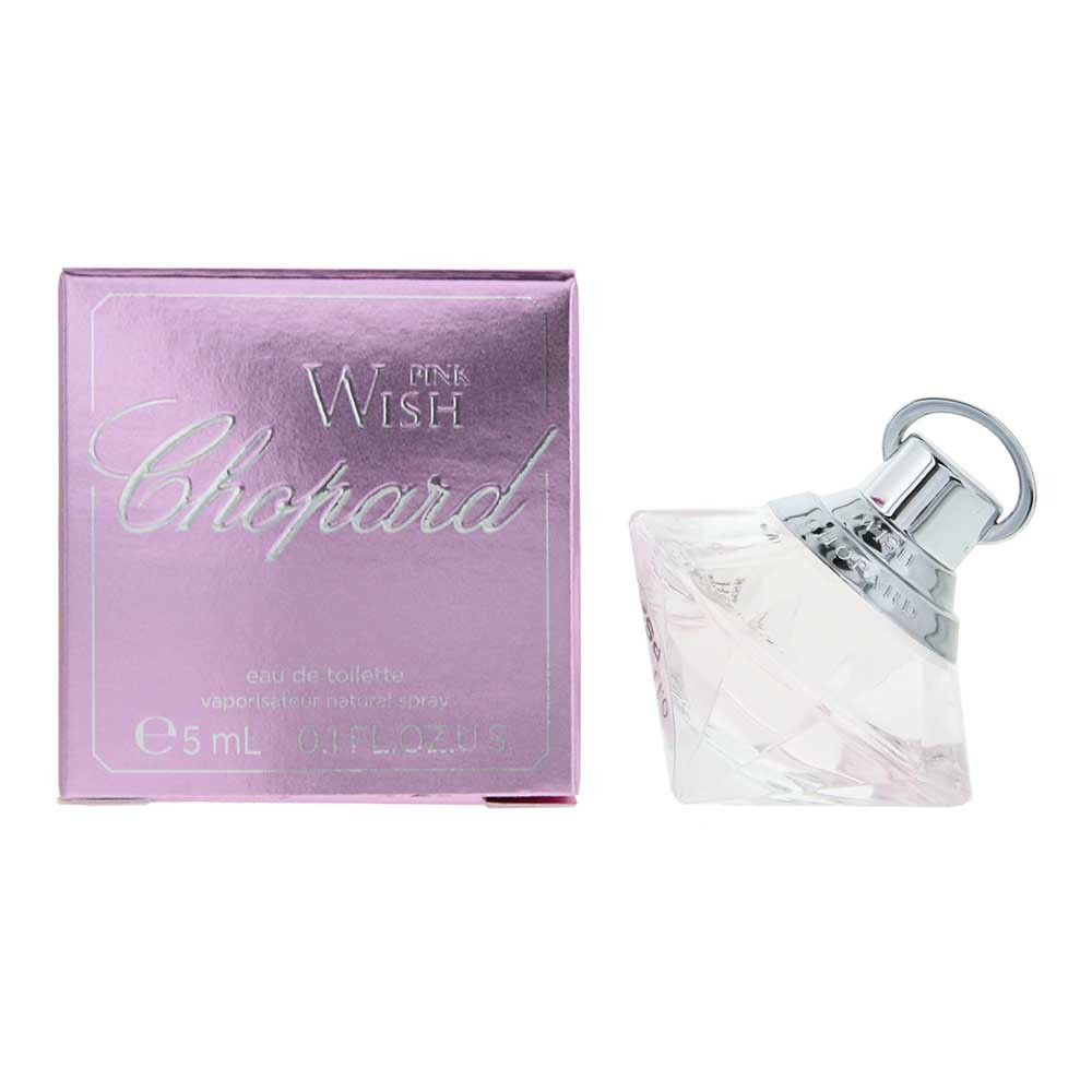 Chopard Wish Pink Diamond Eau De Toilette 5ml mini features a diamond-shaped glass bottle with a silver cap, alongside a shiny pink and silver box.
