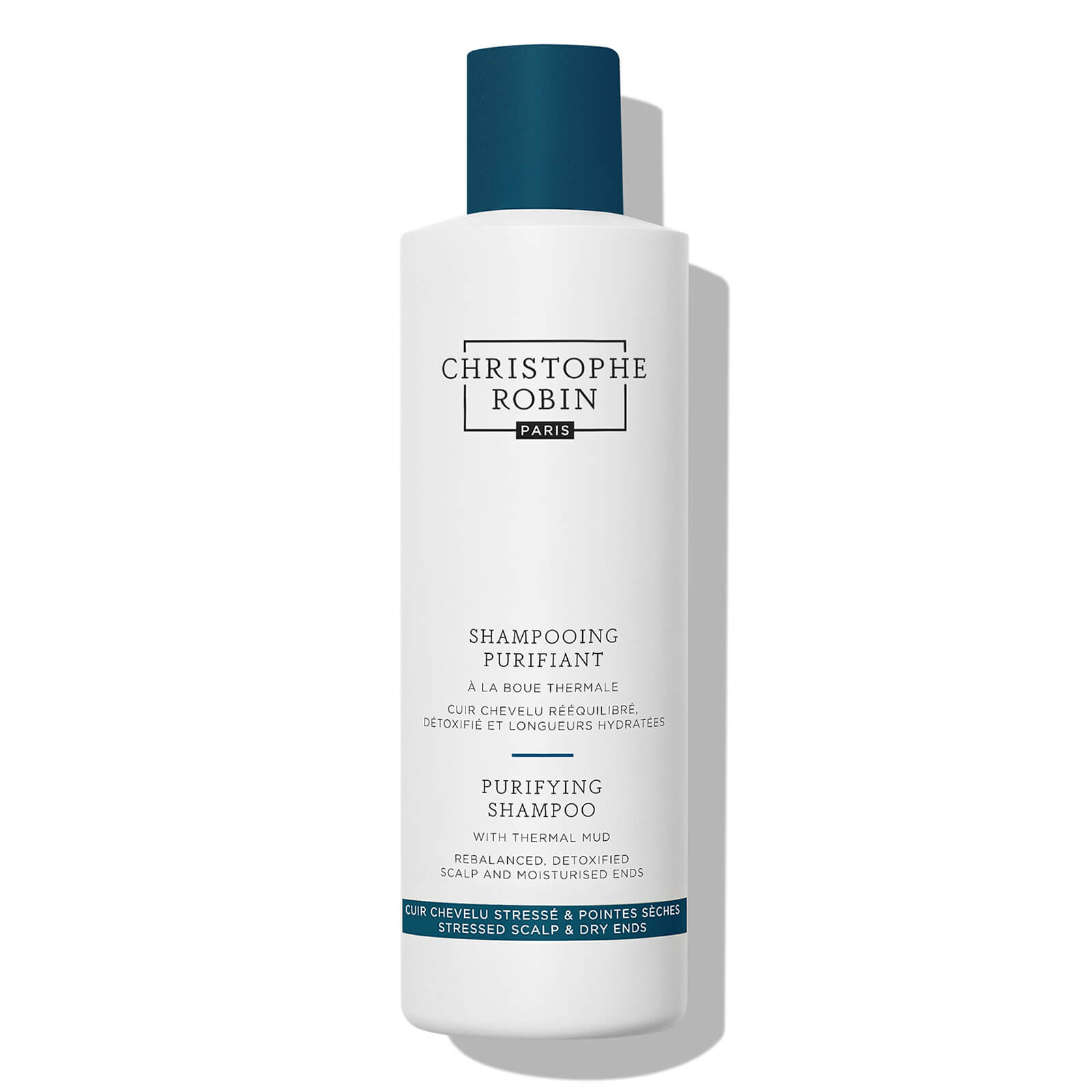White bottle with a blue cap, featuring the label "Christophe Robin Purifying Shampoo with Thermal Mud 250ml" in blue and black text, designed for detoxifying and moisturizing hair.
