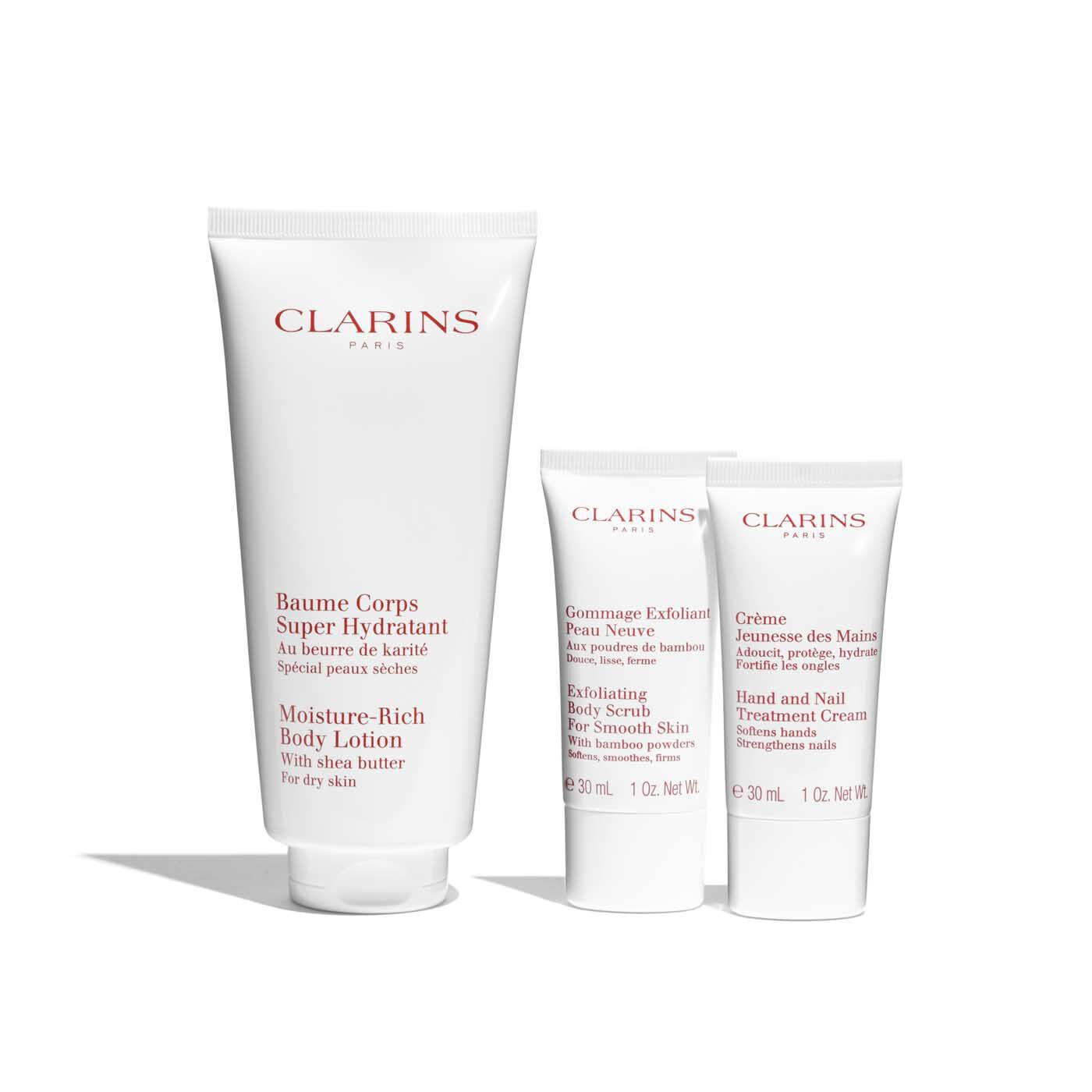 Clarins Body Care Essentials Moisture-Rich Body Lotion + Exfoliating Body Scrub + Hand & Nail Treatment Cream - image 2