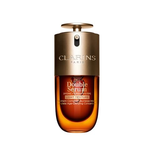 Clarins Double Serum Light Texture in a clear glass bottle with a gold pump top, featuring a rich amber liquid inside and elegant branding on the front.