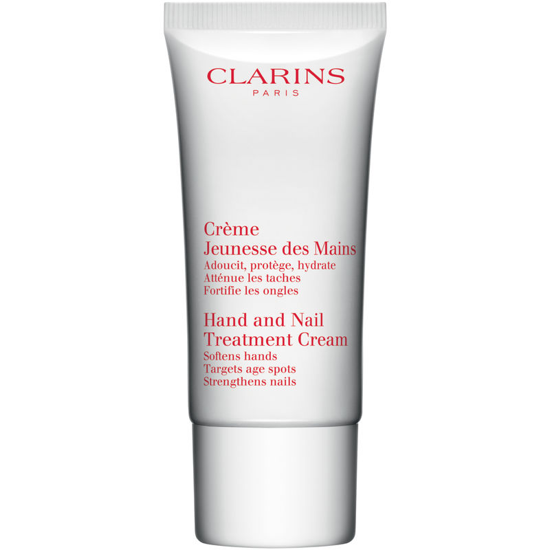 White tube with a silver cap, featuring red text that reads "Clarins" and "Hand and Nail Treatment Cream," designed for softening hands and strengthening nails.