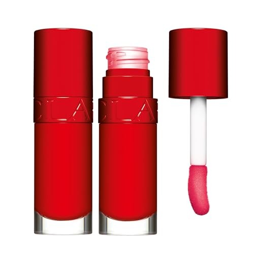 Bright red lip oil in a sleek tube, featuring a clear base and a pink applicator, celebrating Clarins' 10-year anniversary with the shade "54 Iconic Red."