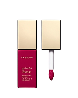 Clarins Intense Comfort Lip Gloss Oil in a 7ml bottle, featuring a sleek gold cap and a vibrant intense pink shade with a doe-foot applicator.