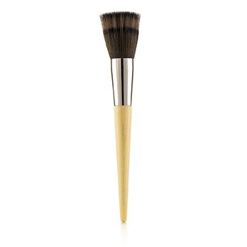 Clarins Multi-Use Foundation Brush features a tapered wooden handle, a silver ferrule, and soft, densely packed bristles for smooth application.