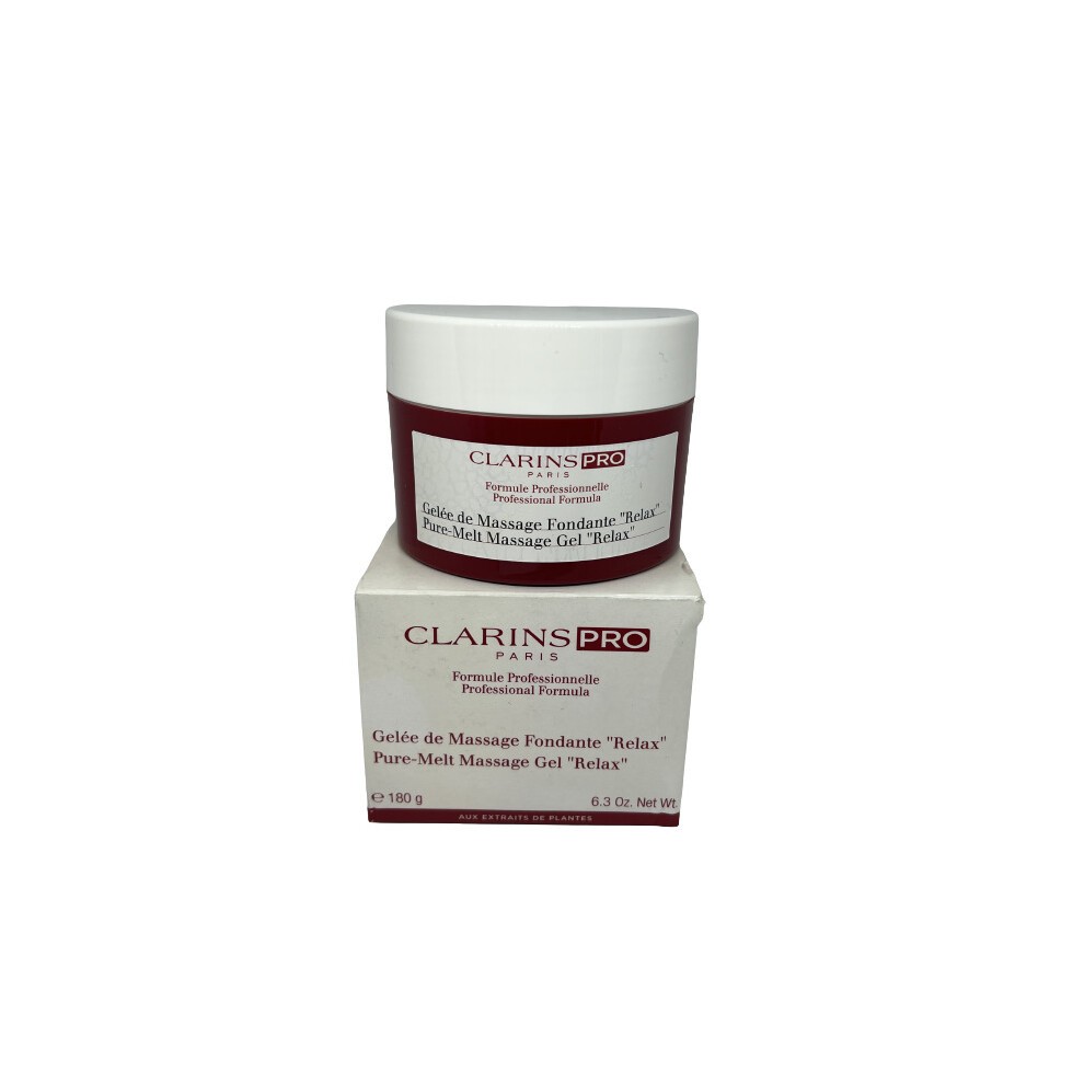 White jar with a burgundy lid, labeled "Clarins Pro" and "Pure-Melt Massage Gel Relax," placed on a matching burgundy and white box, showcasing a professional skincare product.
