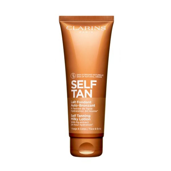 Clarins Self-Tanning Milky Lotion in a 125 ml tube, featuring a sleek, golden-brown design with white text, highlighting its moisturizing and self-tanning properties.