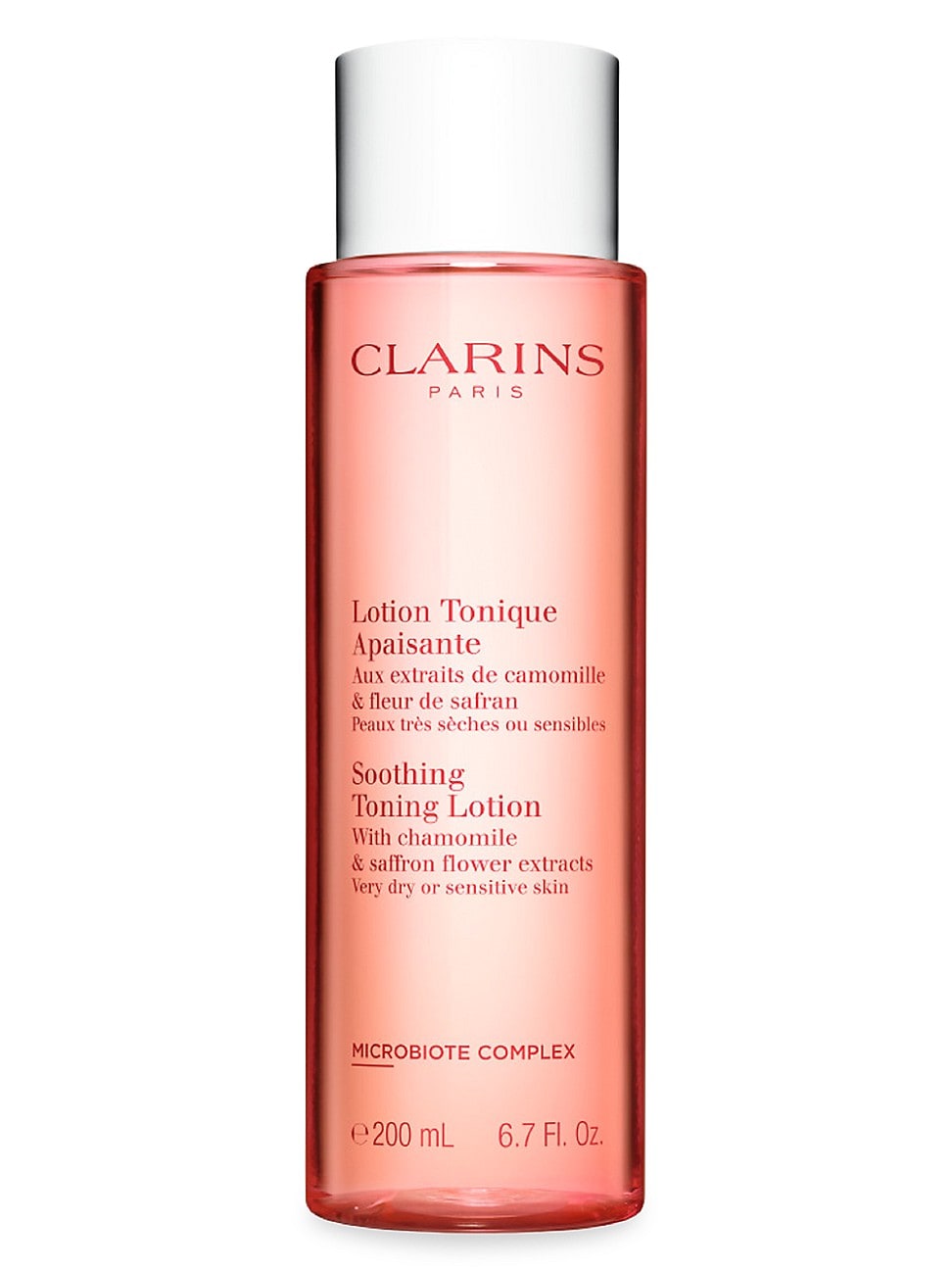 Clear pink bottle of Clarins Soothing Toning Lotion, featuring chamomile and saffron extracts, labeled for very dry or sensitive skin, with a slightly damaged box.