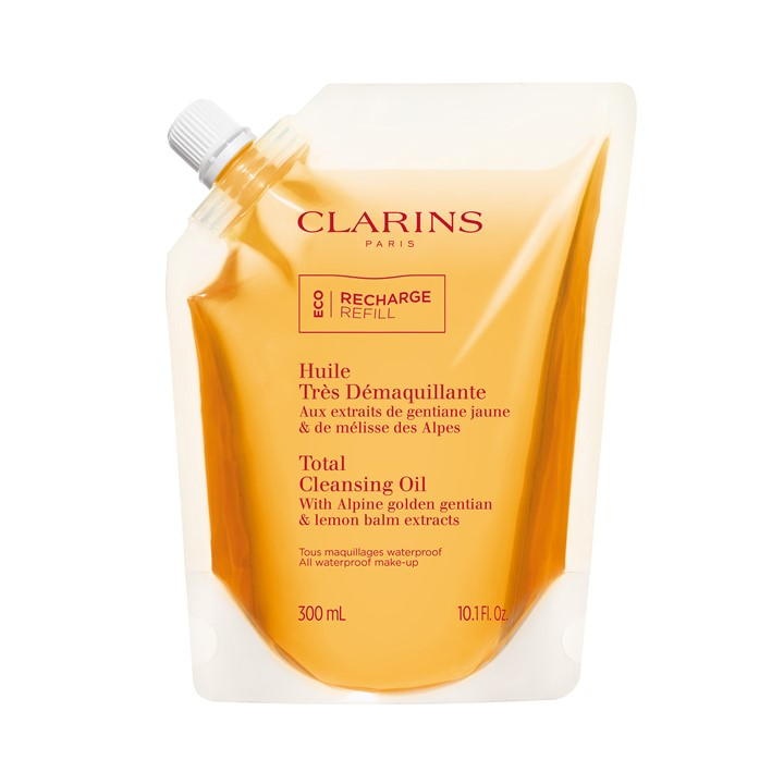 Clarins Total Cleansing Oil Refill in a yellow pouch, featuring a spout for easy pouring, labeled with product details and eco-friendly "Recharge" branding, holds 300 ml.